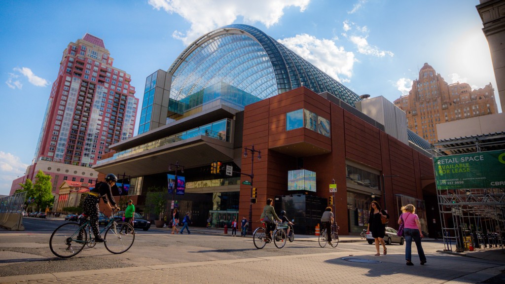 A photo of the Kimmel Center for the Performing Arts, which is a large building with a glass dome.