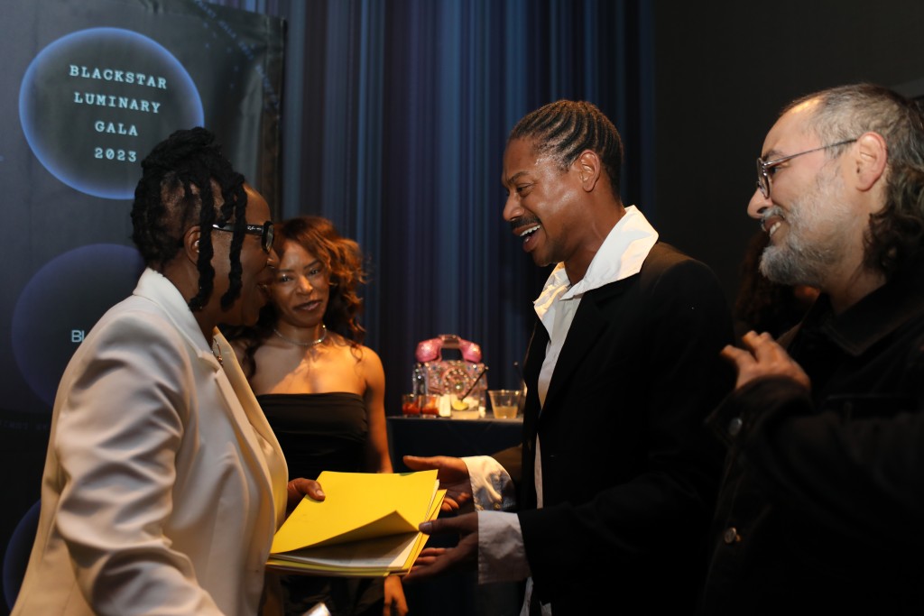 June Givanni (left) meets fellow honorees Telfar Clemens (right) and Babak Radboy (far right) at the 2023 Luminary Gala. Jenn Nkiru looks on (center, back). Photo by Dominique Nicole.