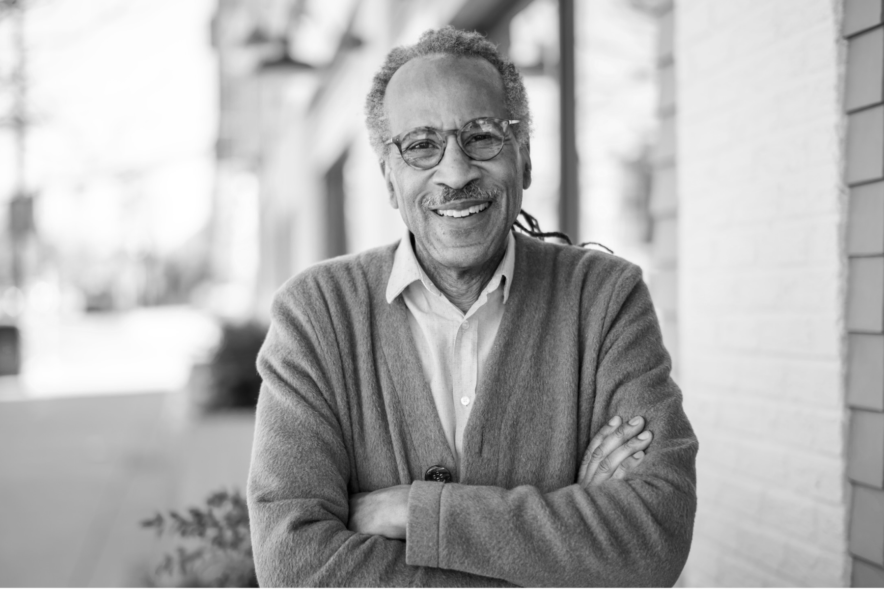  A headshot of Louis Massiah, smiling and looking directly at the camera.