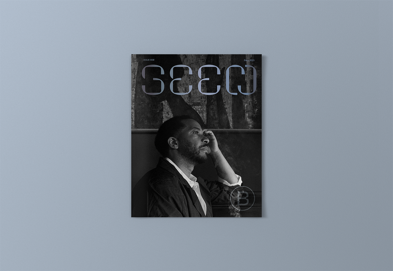 The cover of Seen 009 featuring actor André Holland against a blue-gray backround.